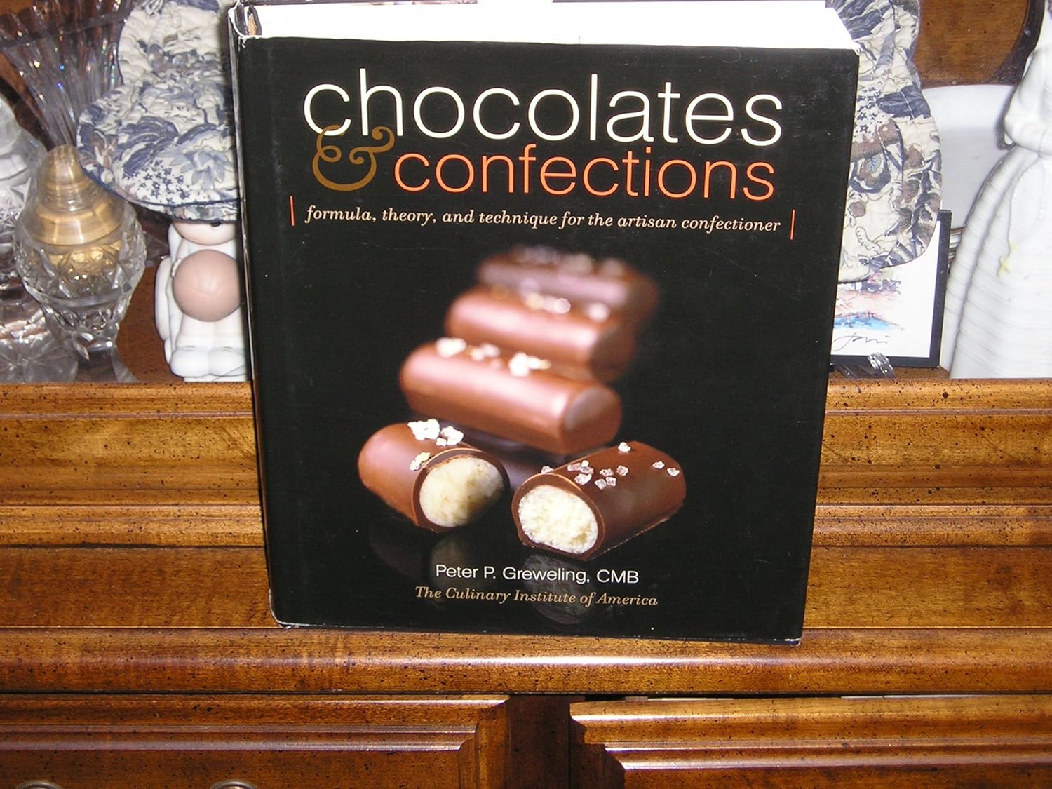 Buy Chocolates and Confections: Formula, Theory, and Technique for the Artisan Confectioner (English, Hardcover, Peter P. Greweling, The Culinary Insti... Online at Best Price - GlowMirror